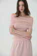 Noir off-shoulder knit in pink