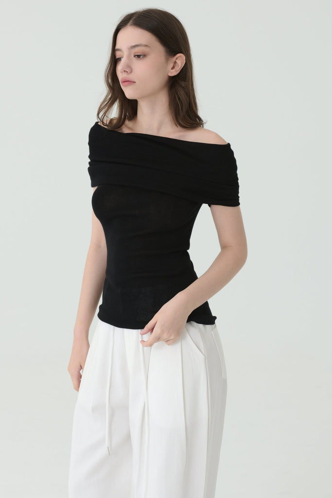Noir off-shoulder knit in black
